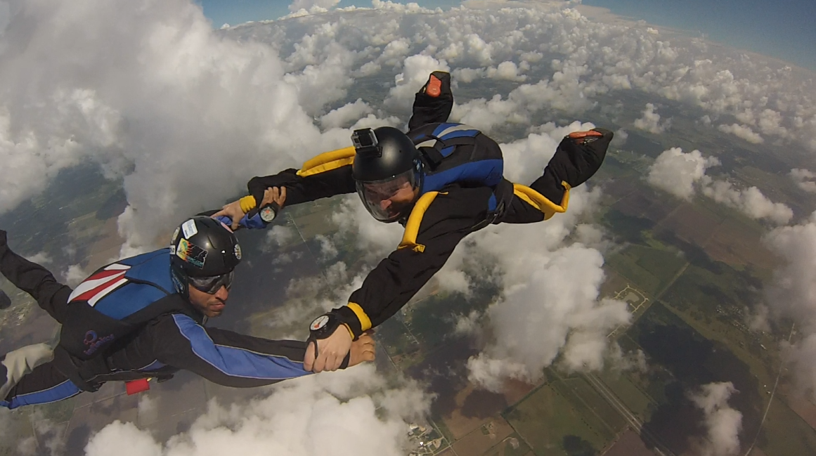 GoPro capture of Michael and friends mid-skydive
